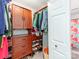 Walk-in closet with ample shelving, drawers, and hanging space at 509 N Graham St # 1G, Charlotte, NC 28202