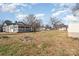 Wide view of a large backyard with storage sheds at 5204 Dellinger Cir, Cherryville, NC 28021