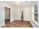 Bright bedroom with hardwood floors, large window, and neutral paint at 5204 Dellinger Cir, Cherryville, NC 28021