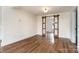 Bedroom with hardwood floors, neutral paint and barn door at 5204 Dellinger Cir, Cherryville, NC 28021