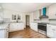 Updated kitchen featuring stainless steel appliances, sleek countertops, and tile backsplash at 5204 Dellinger Cir, Cherryville, NC 28021