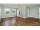 Spacious main bedroom with hardwood floors, ample natural light, and a ceiling fan at 5204 Dellinger Cir, Cherryville, NC 28021