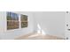 Bright bedroom with hardwood floors and large windows at 5910 Grosner Pl, Charlotte, NC 28211