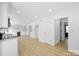 Spacious kitchen with white cabinets, marble countertops and stainless steel appliances at 5910 Grosner Pl, Charlotte, NC 28211