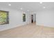 Spacious living room with hardwood floors and natural light at 5910 Grosner Pl, Charlotte, NC 28211