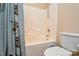 Clean bathroom with shower/tub combo and toilet at 6132 Pale Moss Ln, Charlotte, NC 28269