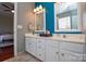 Double vanity bathroom with teal walls and lots of counter space at 6132 Pale Moss Ln, Charlotte, NC 28269