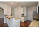 Kitchen with granite countertops and stainless steel appliances at 6132 Pale Moss Ln, Charlotte, NC 28269