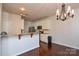 Kitchen boasts granite counters and stainless steel appliances at 6132 Pale Moss Ln, Charlotte, NC 28269