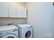 Laundry room with washer and dryer at 6132 Pale Moss Ln, Charlotte, NC 28269