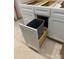 White shaker cabinets with a pull-out trash can at 7287 Gabriel St, Sherrills Ford, NC 28673