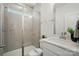 Modern bathroom featuring a glass-enclosed shower and a sleek white vanity at 8230 Verona Rd # 80, Charlotte, NC 28213