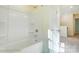 Clean bathroom with a shower/tub combo and built-in shelving at 8230 Verona Rd # 80, Charlotte, NC 28213