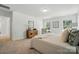 Cozy bedroom featuring a comfortable bed, warm accents, and a minimalist decor at 8230 Verona Rd # 80, Charlotte, NC 28213