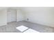 Large bedroom with sloped ceilings and double closets at 8230 Verona Rd # 80, Charlotte, NC 28213