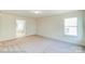 Bedroom with window and access to bathroom at 8230 Verona Rd # 80, Charlotte, NC 28213