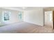 Bright bedroom with two windows and carpet at 8230 Verona Rd # 80, Charlotte, NC 28213