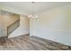 Formal dining room with hardwood floors and wainscoting at 8230 Verona Rd # 80, Charlotte, NC 28213