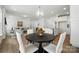 Open-concept living room, dining room and kitchen area is great for entertaining guests at 8230 Verona Rd # 80, Charlotte, NC 28213