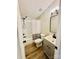 Updated bathroom with vanity, toilet and tub shower combo at 9763 Knightbridge Dr, Concord, NC 28025