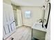 Updated bathroom with double vanity and walk-in shower at 9763 Knightbridge Dr, Concord, NC 28025