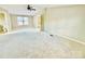 Spacious bedroom with carpeted floors and ceiling fan at 9763 Knightbridge Dr, Concord, NC 28025