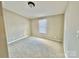 Spacious bedroom with neutral walls and carpeted floor at 9763 Knightbridge Dr, Concord, NC 28025