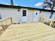 Newly built wooden deck with railings at 9763 Knightbridge Dr, Concord, NC 28025