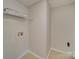 Laundry area with shelving and hookups for washer and dryer at 11316 Vista Canyon Dr, Charlotte, NC 28226