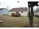 Backyard view showing a house with a deck at 2038 Mallard Creek Dr, Rock Hill, SC 29732