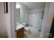 Clean bathroom with tub, toilet and vanity with mirror at 2038 Mallard Creek Dr, Rock Hill, SC 29732