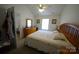 Main bedroom with king bed, dresser, and ceiling fan at 2038 Mallard Creek Dr, Rock Hill, SC 29732