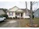 House exterior featuring a yellow vinyl siding and a small front porch at 2038 Mallard Creek Dr, Rock Hill, SC 29732
