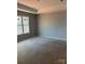 Unfinished bedroom with natural light, featuring large windows and a smooth blank canvas for personalization at 3343 48Th Ne Ave # 15B, Hickory, NC 28601