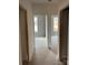 A hallway in an unfinished home offering views into multiple rooms each featuring windows and natural light at 3343 48Th Ne Ave # 15B, Hickory, NC 28601