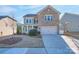 Two-story house with brick and siding, attached garage, and manicured lawn at 442 Hunton Forest Nw Dr, Concord, NC 28027