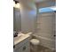 Well-lit bathroom with a shower-tub combo and a modern vanity at 6319 Honor Ave, Midland, NC 28107