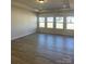 Bright living room with recessed lighting and natural light from large windows at 6319 Honor Ave, Midland, NC 28107