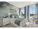 Serene bedroom featuring a coastal-themed wall and decor at 7108 Brookview Ln, Sherrills Ford, NC 28673