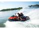 Couple riding a jet ski on a lake at 7108 Brookview Ln, Sherrills Ford, NC 28673