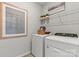 Convenient laundry room with washer, dryer, and ample storage at 7108 Brookview Ln, Sherrills Ford, NC 28673