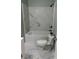 Modern bathroom with marble shower and bathtub at 815 Jefferson St, Shelby, NC 28150