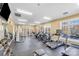 Well-equipped fitness center, featuring treadmills, ellipticals, and weights at 9105 Mcdowell Creek Ct, Cornelius, NC 28031