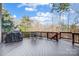 Deck with table, chairs, and a grill at 9890 Legolas Ln, Charlotte, NC 28269