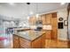 Spacious kitchen with granite countertops and wood cabinets at 9890 Legolas Ln, Charlotte, NC 28269