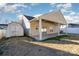 Home's back elevation, featuring a patio and storage shed at 1630 Hardy Dr, Rock Hill, SC 29732