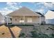 View of back house with covered patio and fenced yard at 1630 Hardy Dr, Rock Hill, SC 29732