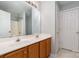 Double vanity bathroom with wood cabinets and a shower at 1630 Hardy Dr, Rock Hill, SC 29732