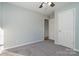 Bright bedroom with ceiling fan and neutral carpeting at 1630 Hardy Dr, Rock Hill, SC 29732