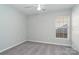 Spacious bedroom featuring a ceiling fan and window with blinds at 1630 Hardy Dr, Rock Hill, SC 29732